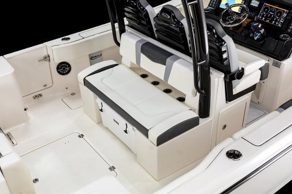 Manufacturer Provided Image: 2025 Robalo R300 Center Console boat interior with seating and control panel.