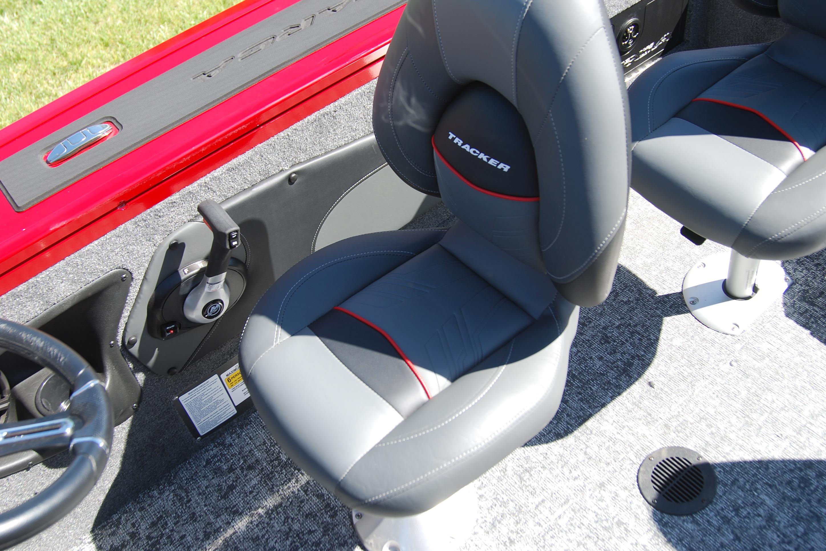 2026 Tracker Targa V-18 WT boat interior with gray seats and steering controls.