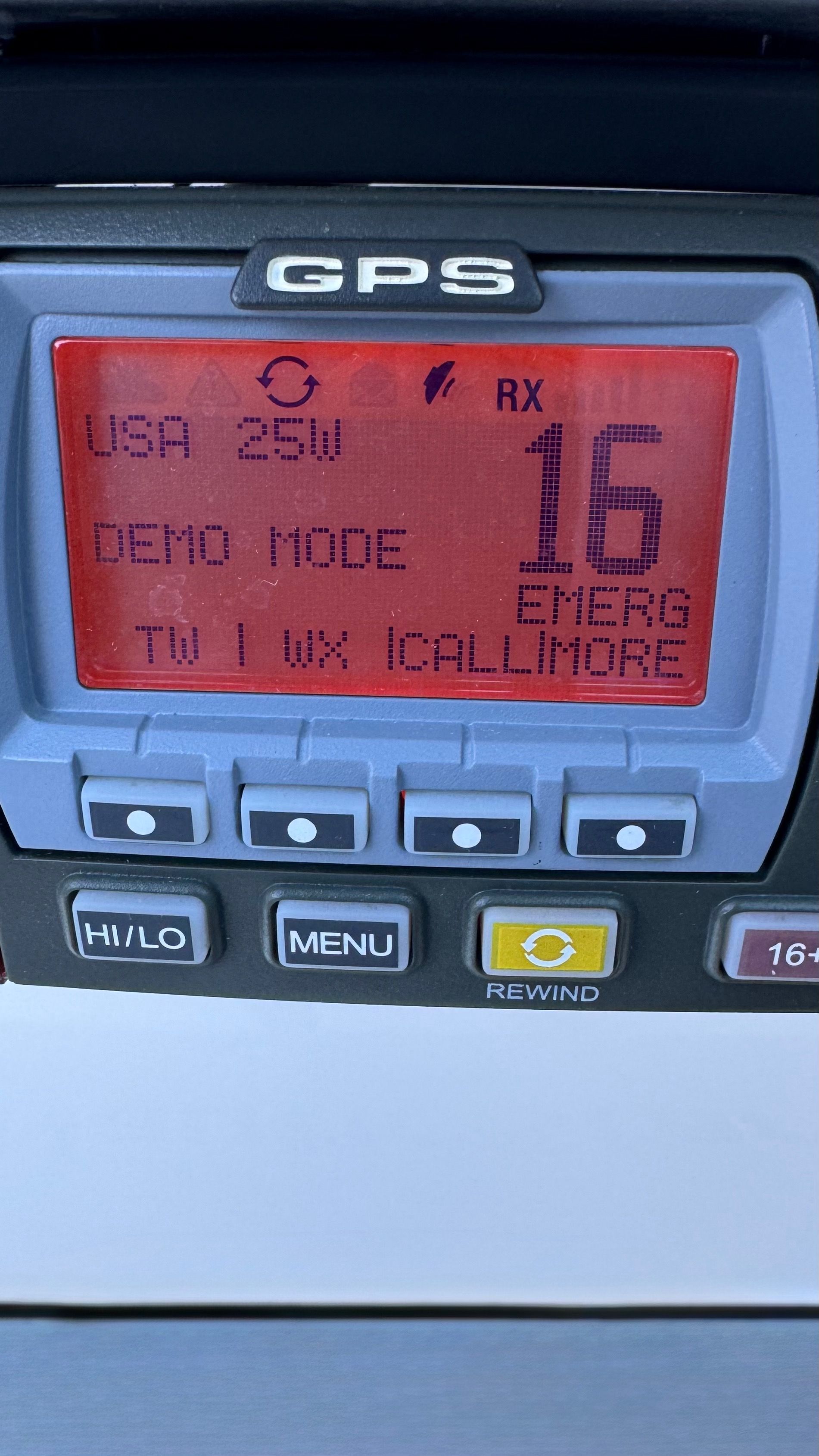 Close-up of a GPS device with various buttons and a digital display.