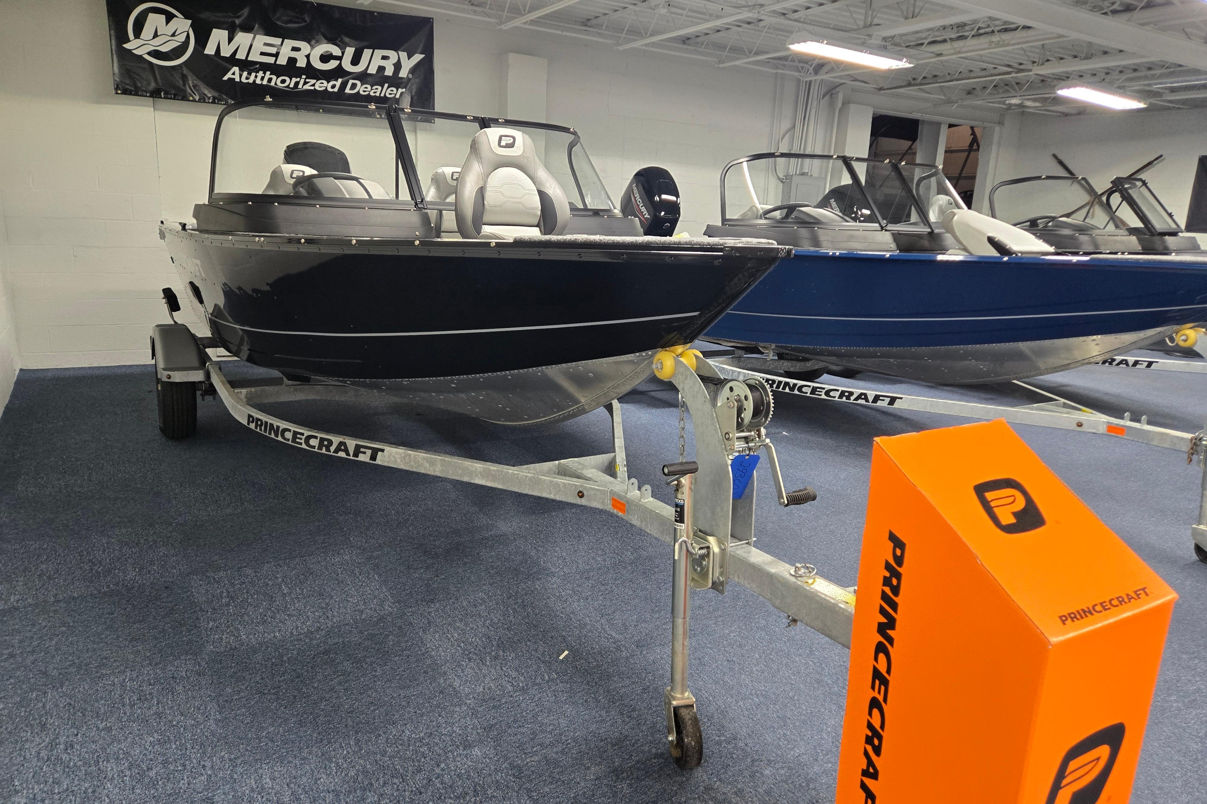 2026 Princecraft Holiday 162 WS MAX boat displayed at Mercury authorized dealer showroom.
