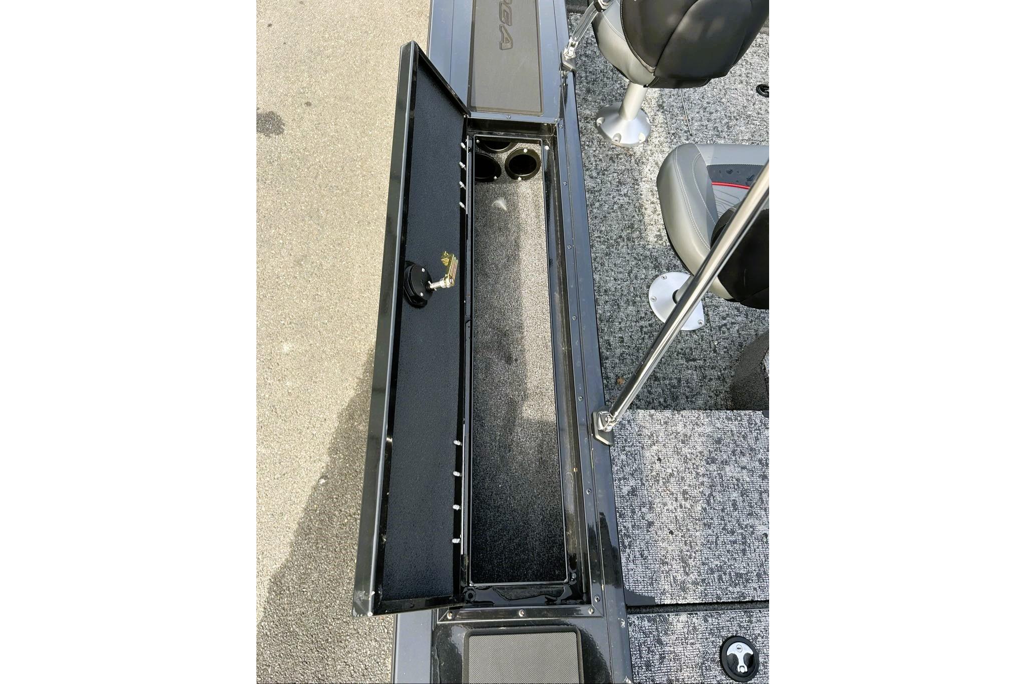 2026 Tracker Targa V-18 Combo boat interior with open storage compartment and seating.
