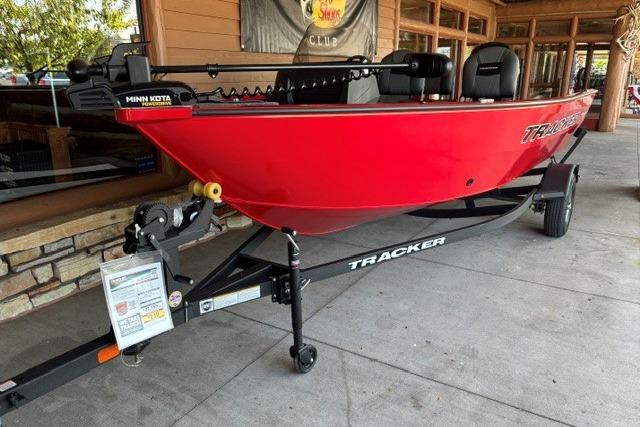 2026 Tracker Pro Guide V-16 SC boat in vibrant red on a trailer.