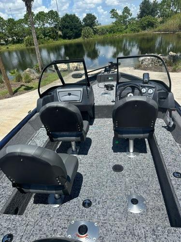 2025 Bass Tracker PGV16WT boat interior with dual seats and steering console.