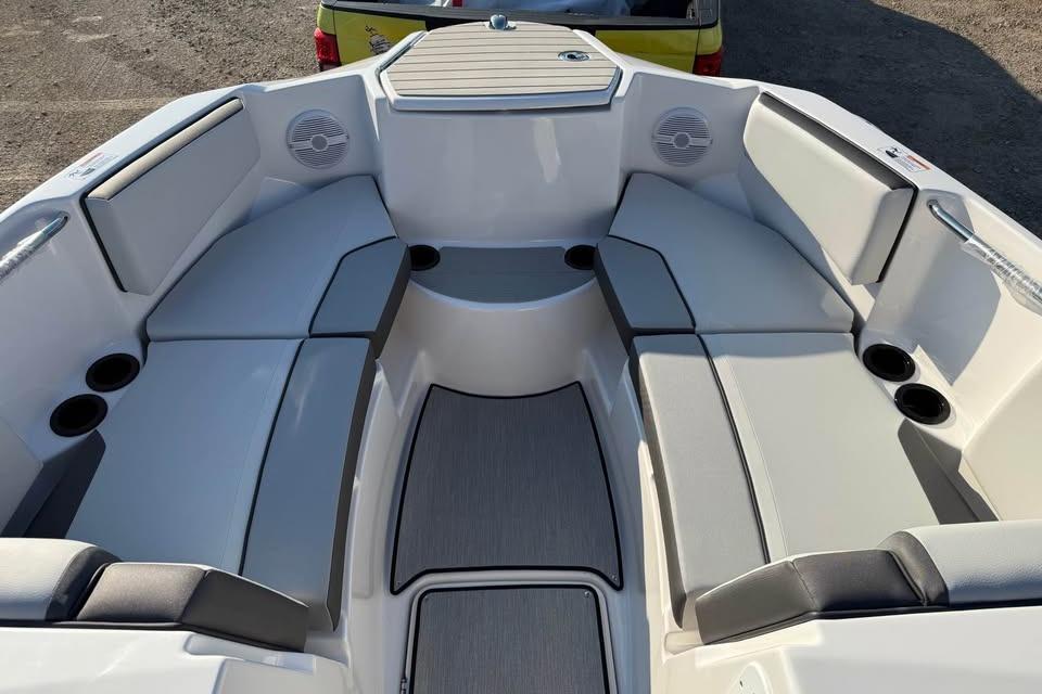 2026 Yamaha Boats AR220 interior with spacious seating and cup holders.