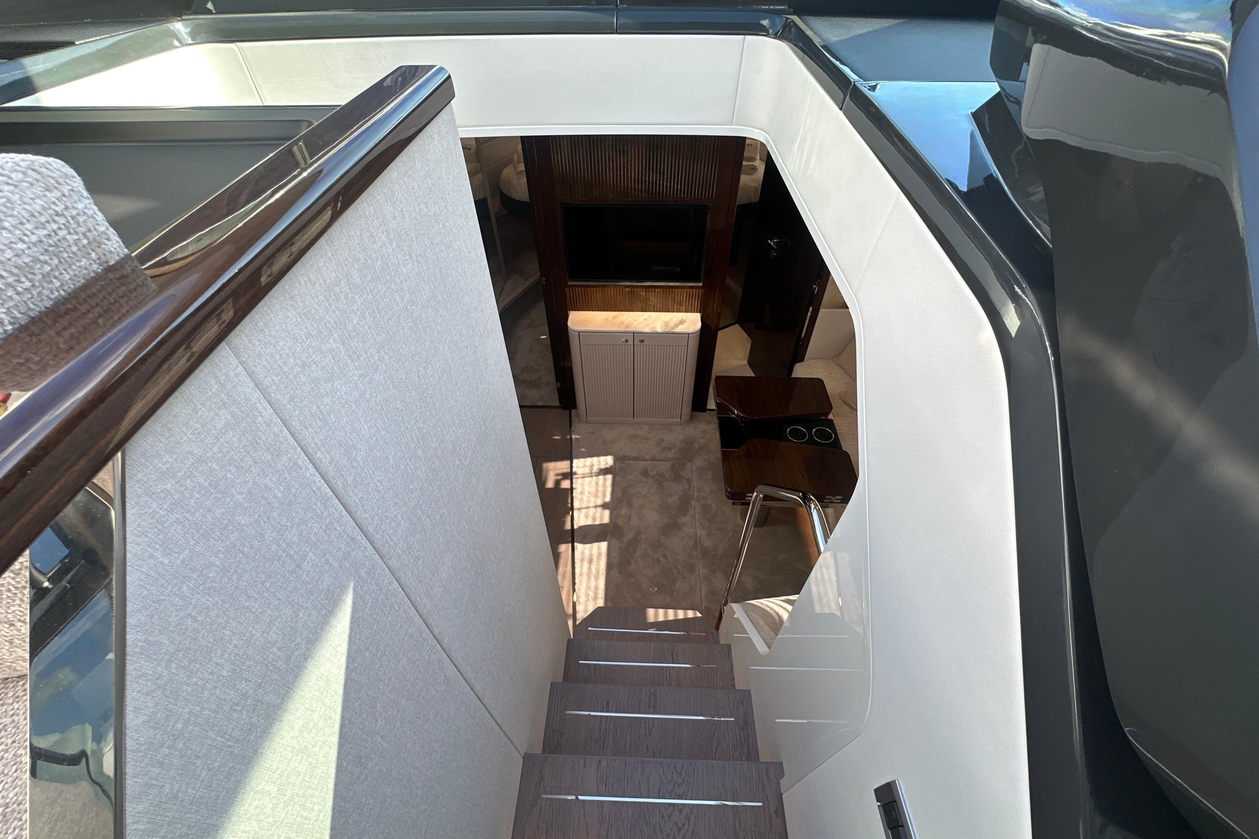Interior staircase of 2026 Fairline Targa 47 GT yacht, featuring modern design and luxury finishes.
