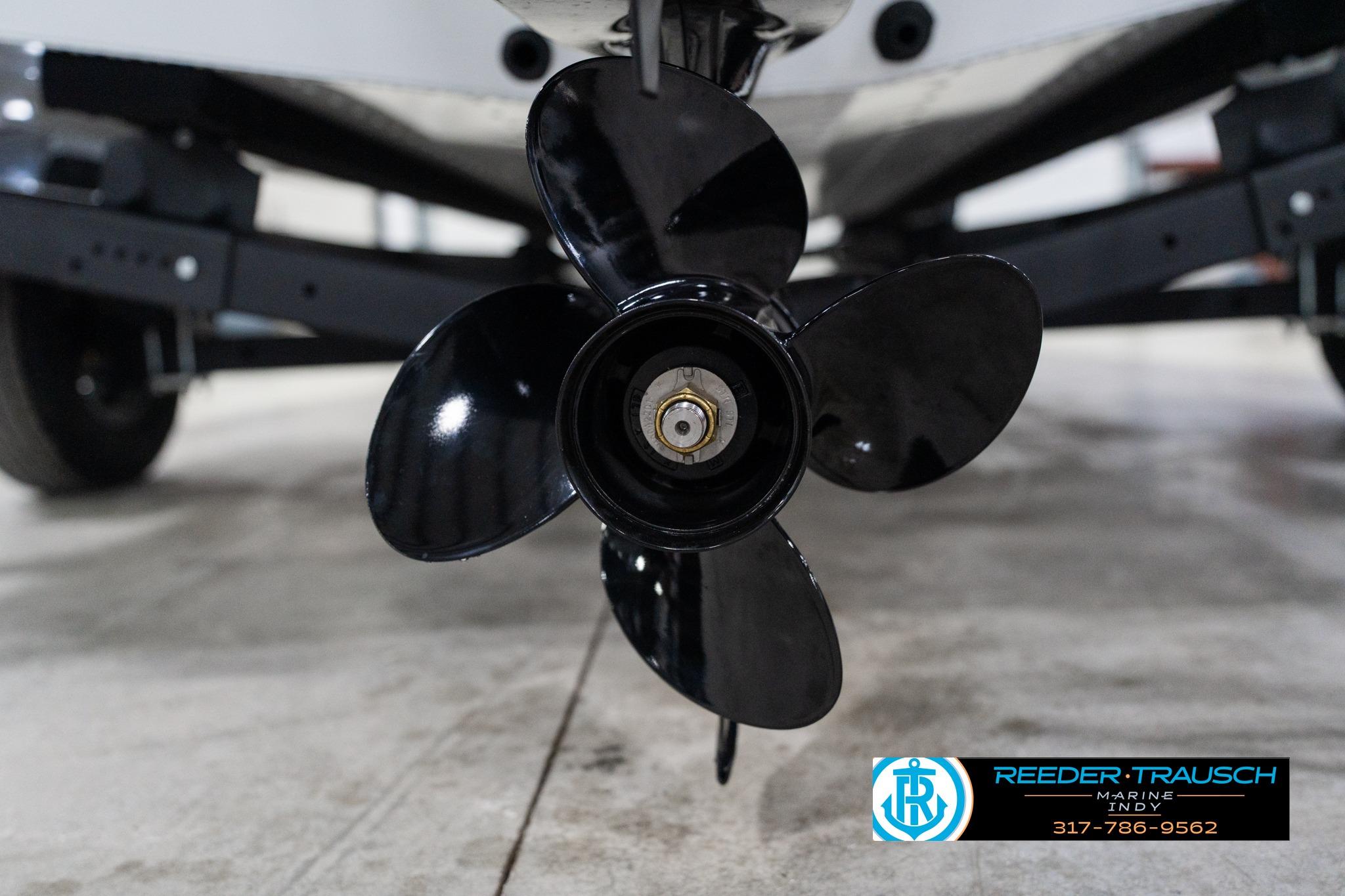 Close-up of a 2026 Lund 1700 Explorer Sport boat propeller on a trailer.