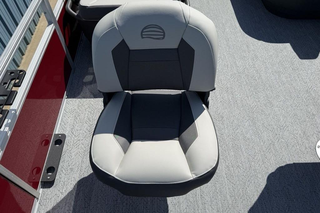 2026 Sun Tracker Bass Buggy 18 DLX boat seat, gray and black upholstery, on deck.