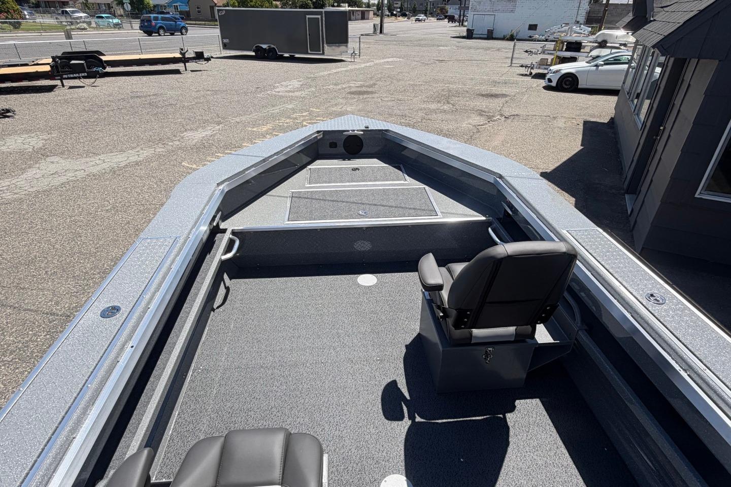 2026 Thunder Jet 209 Rush OT boat interior with seating and spacious deck.