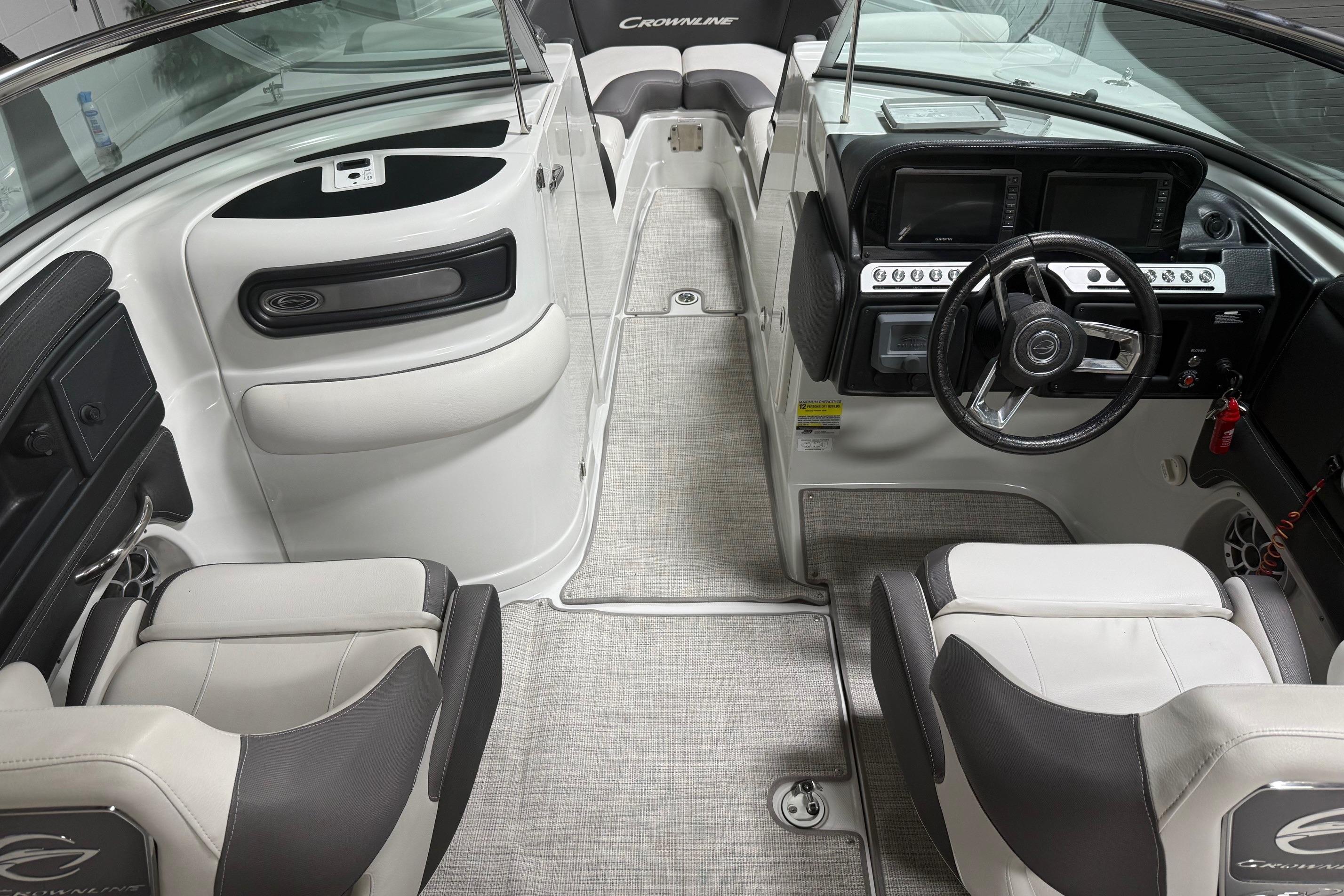 2023 Crownline 260 SS boat interior with modern dashboard and seating.