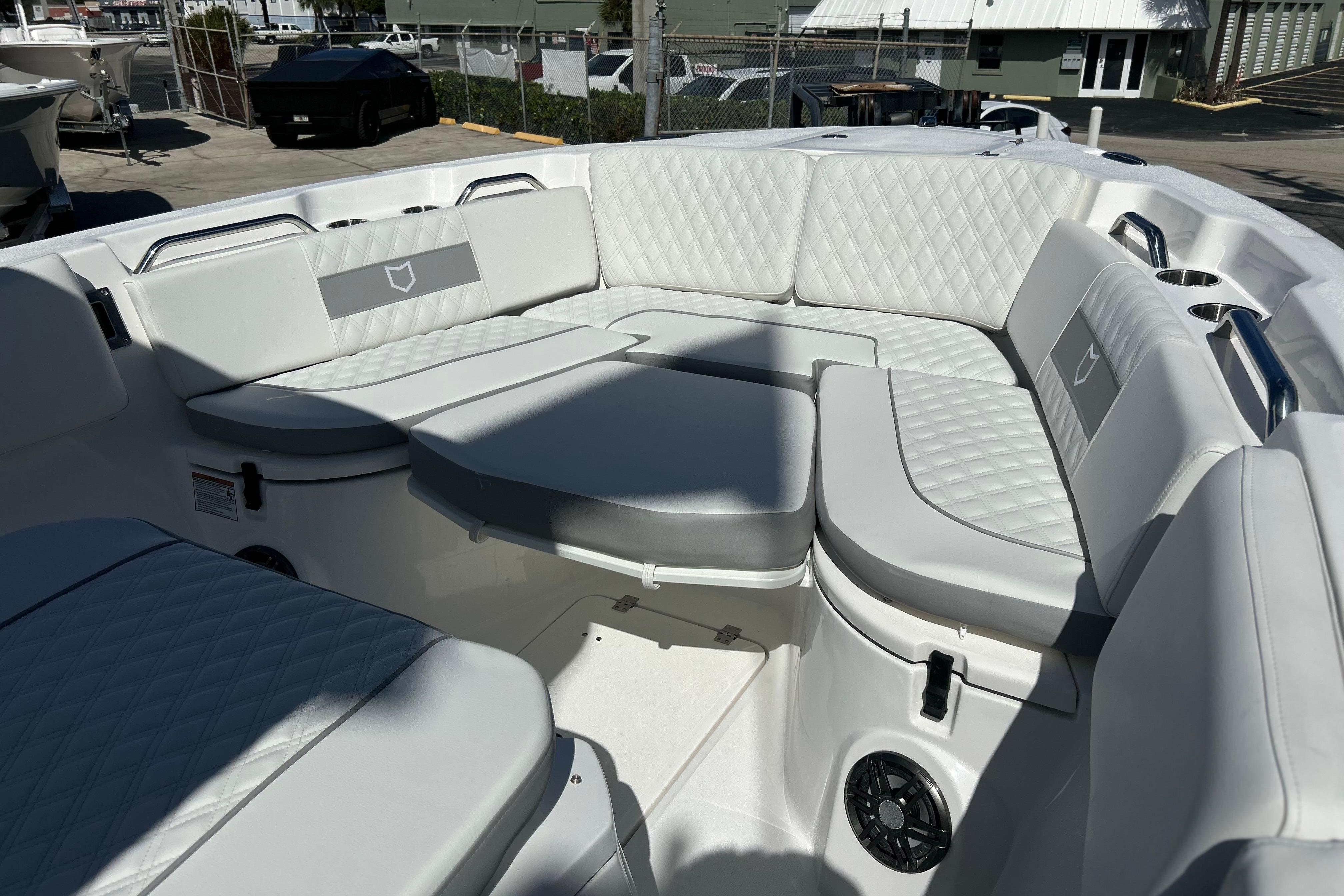 Luxurious seating area on 2026 Sea Fox 268 Commander boat, featuring quilted upholstery.