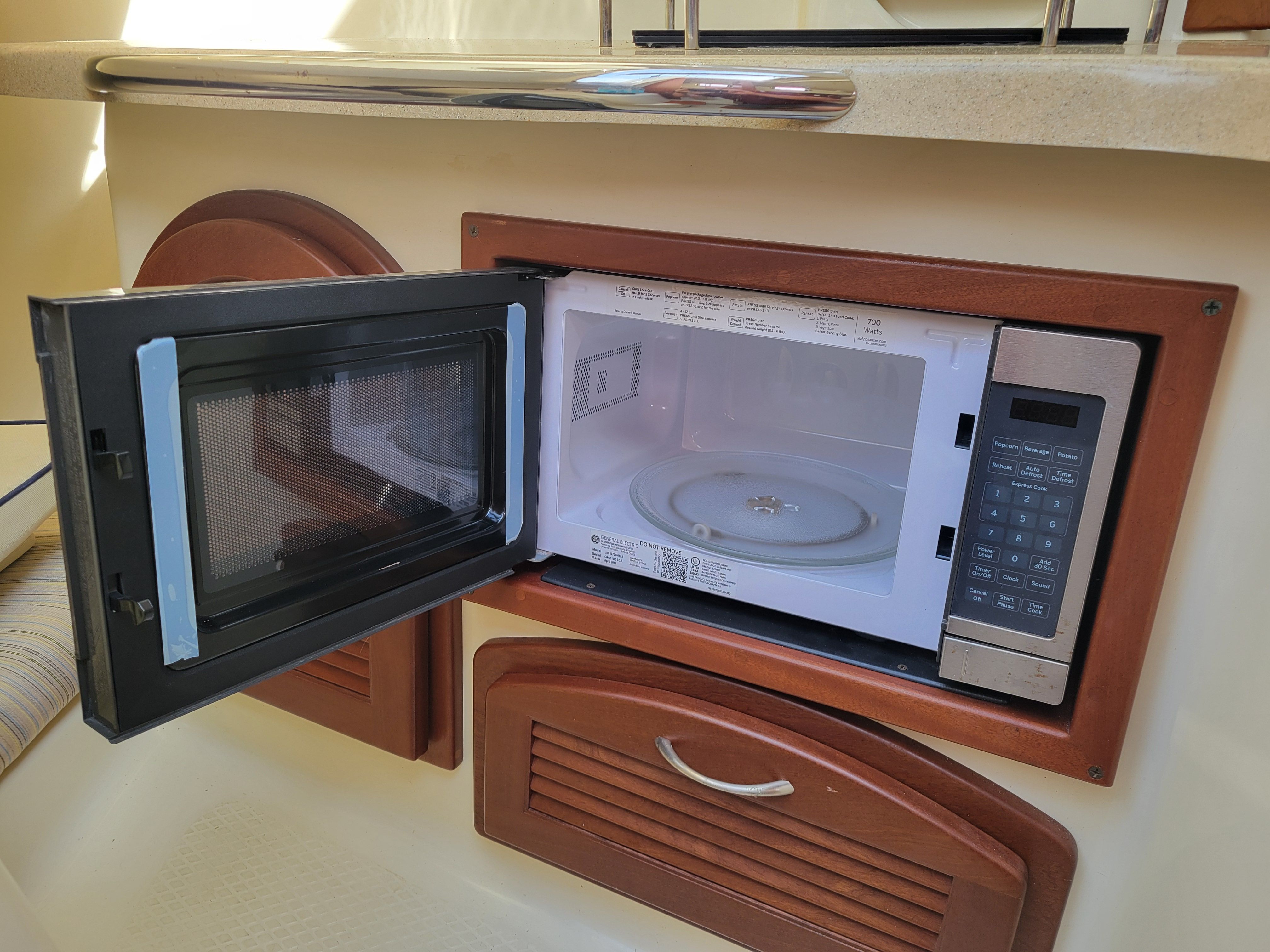 Microwave in the galley of a 2018 Hake Seaward 26 RK yacht.