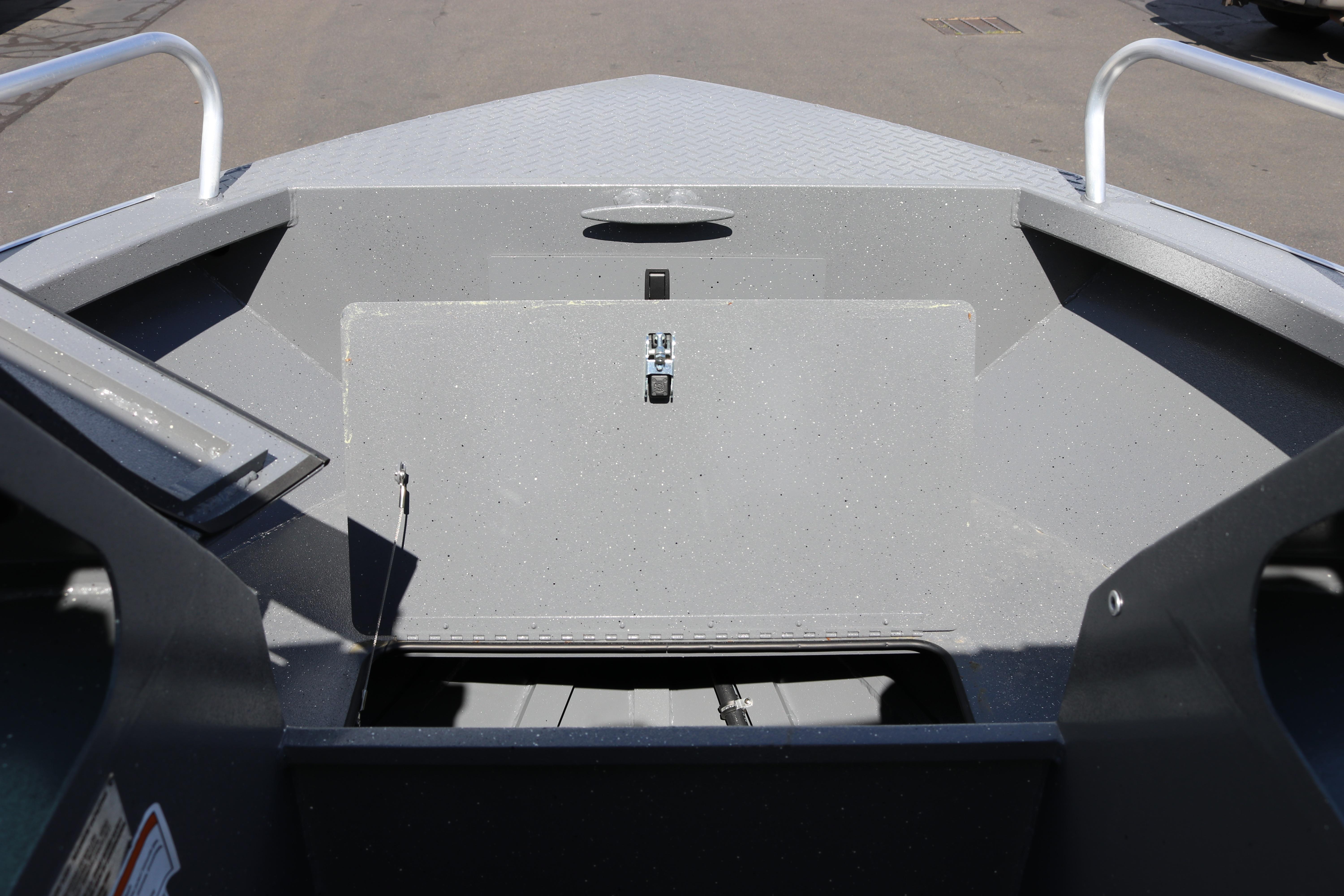 2025 Alumaweld Stryker X202 boat interior, showcasing storage compartment and sleek design.