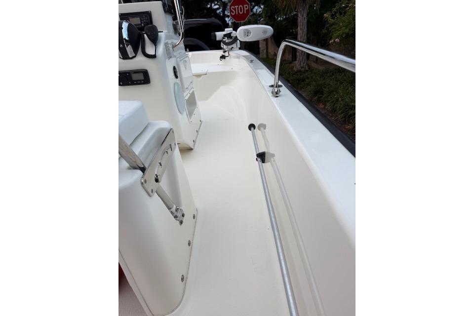2016 Boston Whaler 150 Montauk boat interior with steering console and seating.