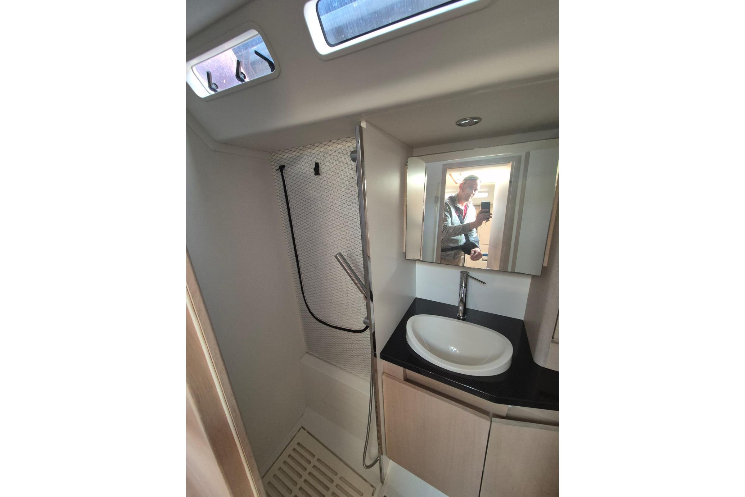Bathroom interior of 2015 Solaris 50 yacht with shower and sink.