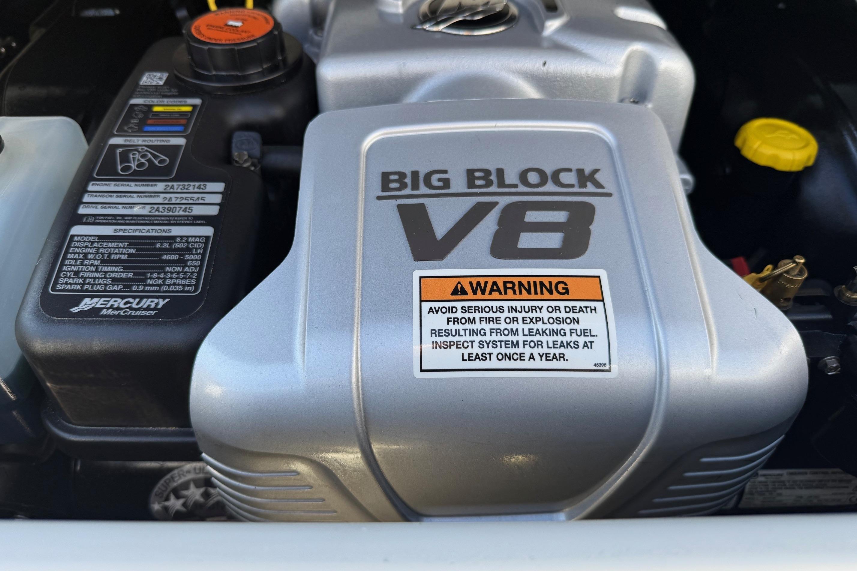2023 Crownline 290 SS engine, featuring a Big Block V8 with safety warning label.