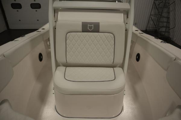 2025 Sea Fox 228 Commander boat interior with cushioned seating.