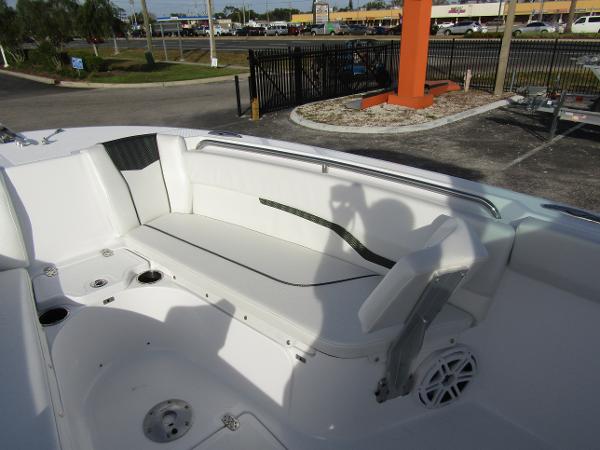 2025 Wellcraft 243 Fisherman boat interior with seating and speaker.