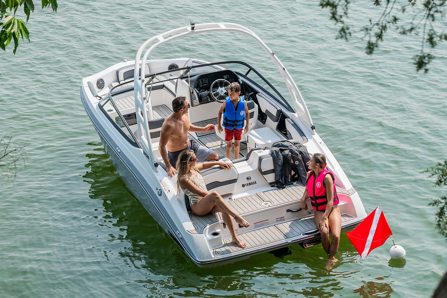 Manufacturer Provided Image: 2026 Yamaha Boats 195S with people enjoying a sunny day on the water.