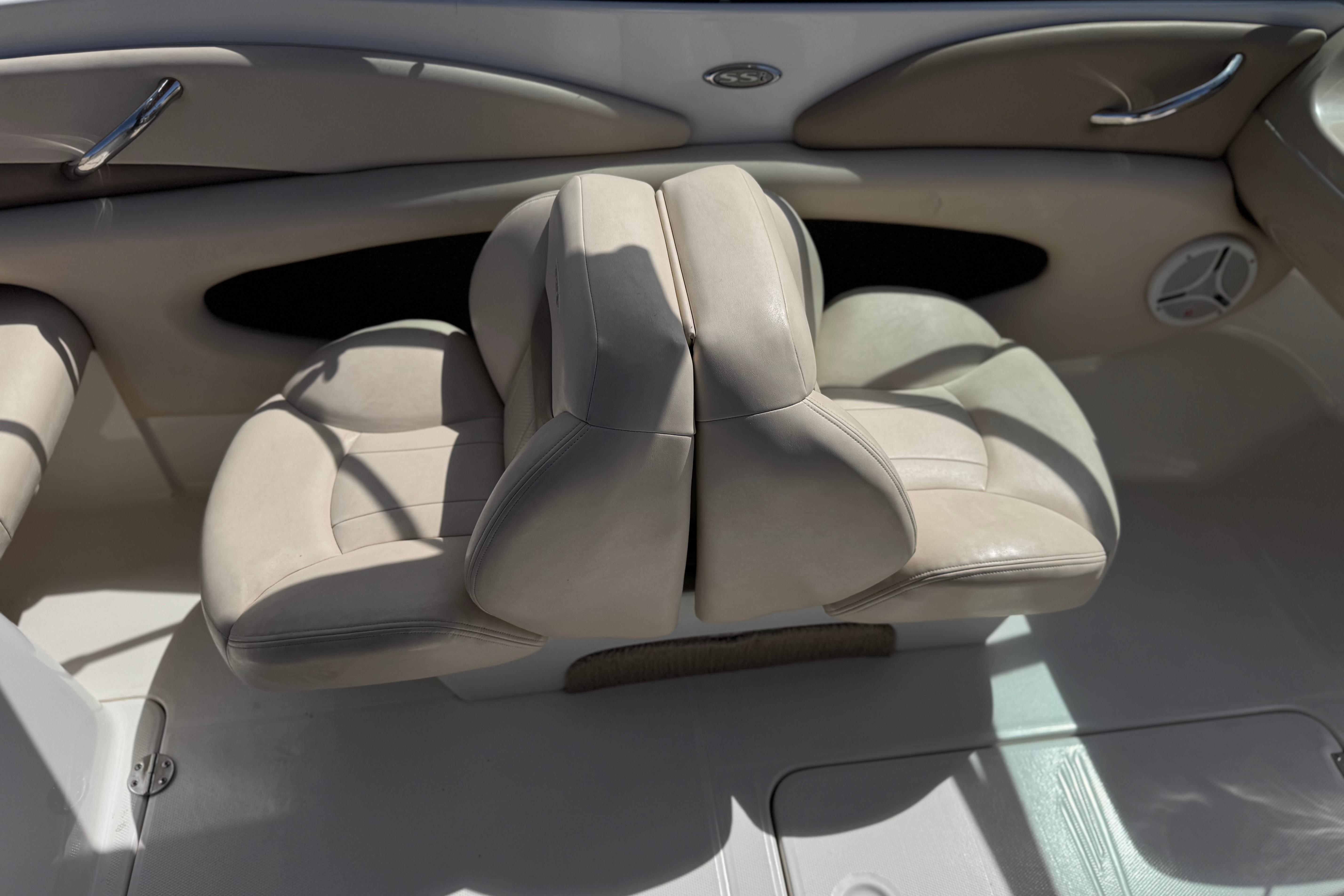 2006 Chaparral 190 SSi boat interior with beige seating and sleek design.