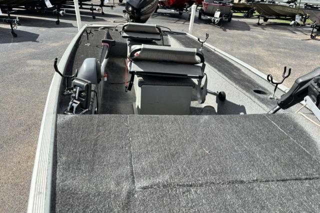 2015 Tracker Panfish 16 boat interior with seating and fishing rod holders.