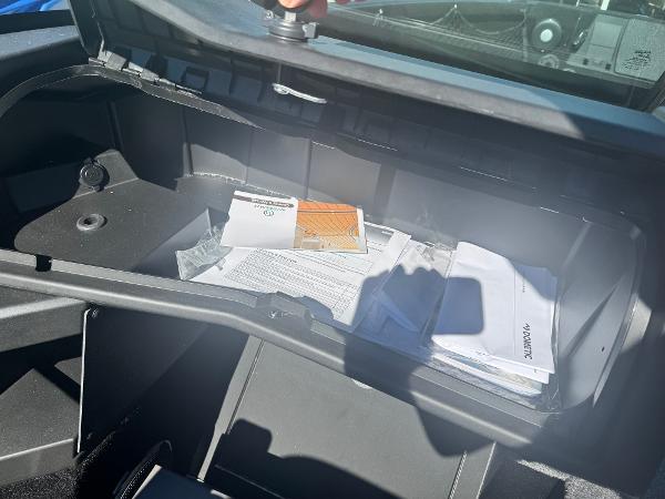 Open storage compartment of 2025 Alumacraft Trophy 185X SC Rotax S boat.