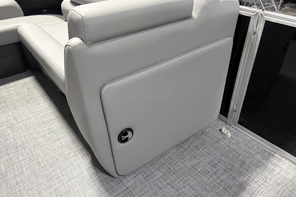 2026 Sun Tracker PARTY BARGE® 20 DLX interior with gray seating and flooring.