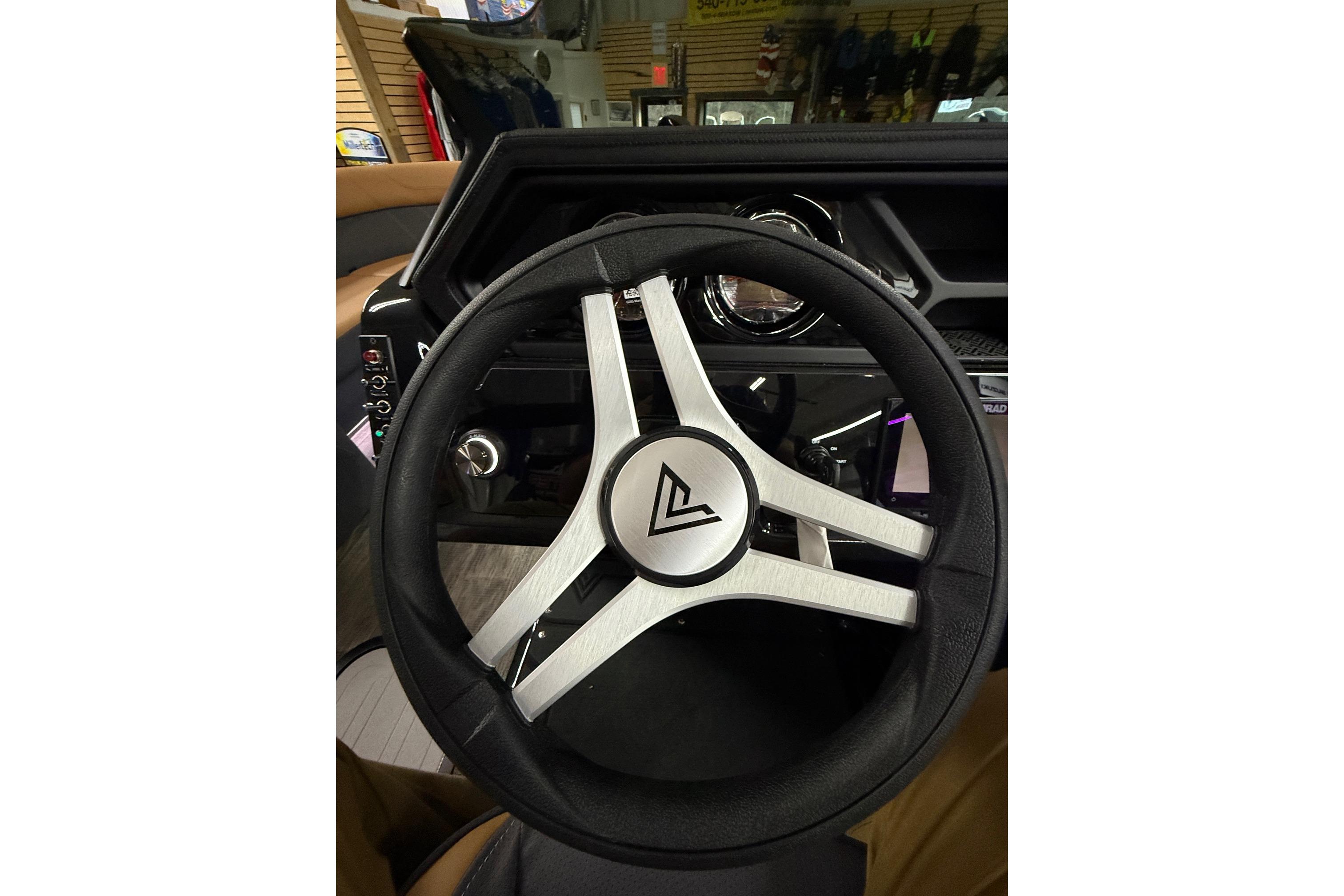 Steering wheel of 2025 Viaggio Z22S, featuring a sleek, modern design.