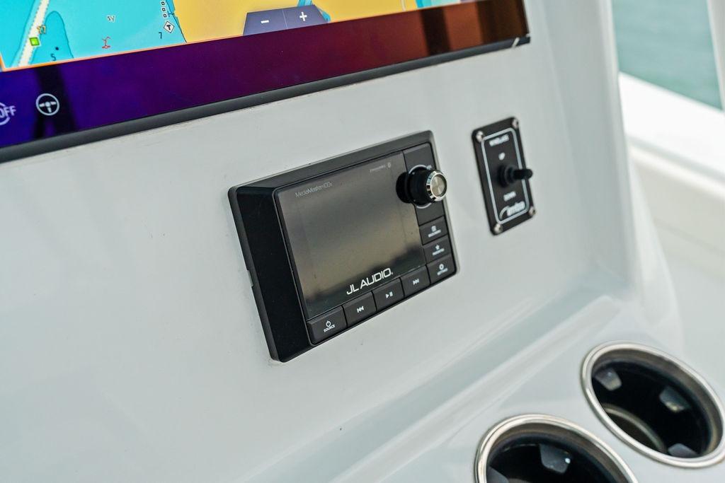 Control panel of 2021 Yellowfin 36 Offshore boat with JL Audio system.