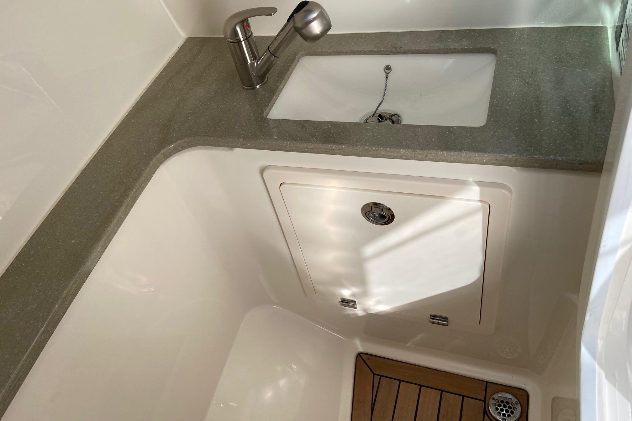 2024 Boston Whaler 320 Vantage interior sink and countertop detail.