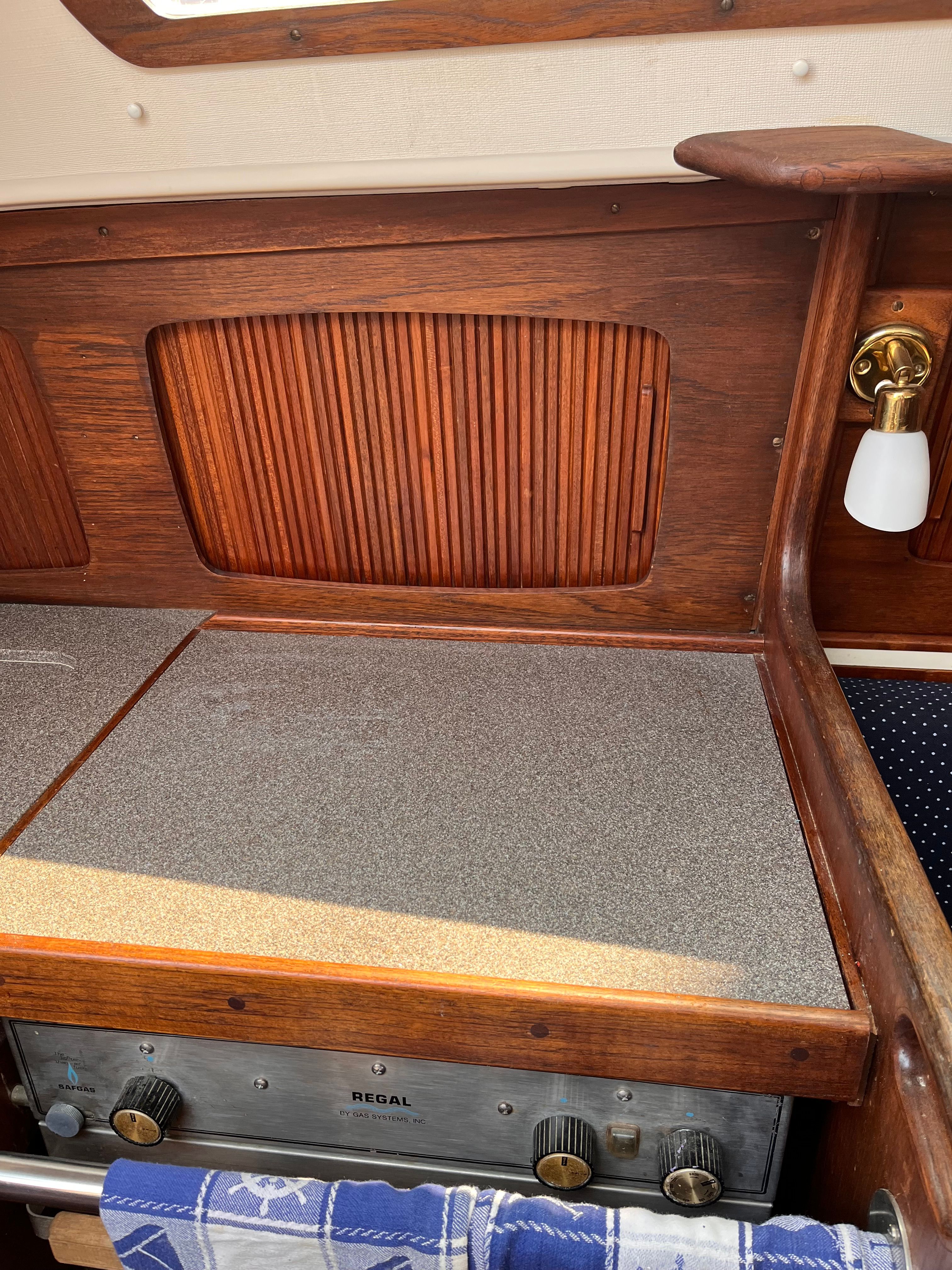 Interior of a 1989 Sabre 30 III yacht with wooden paneling.