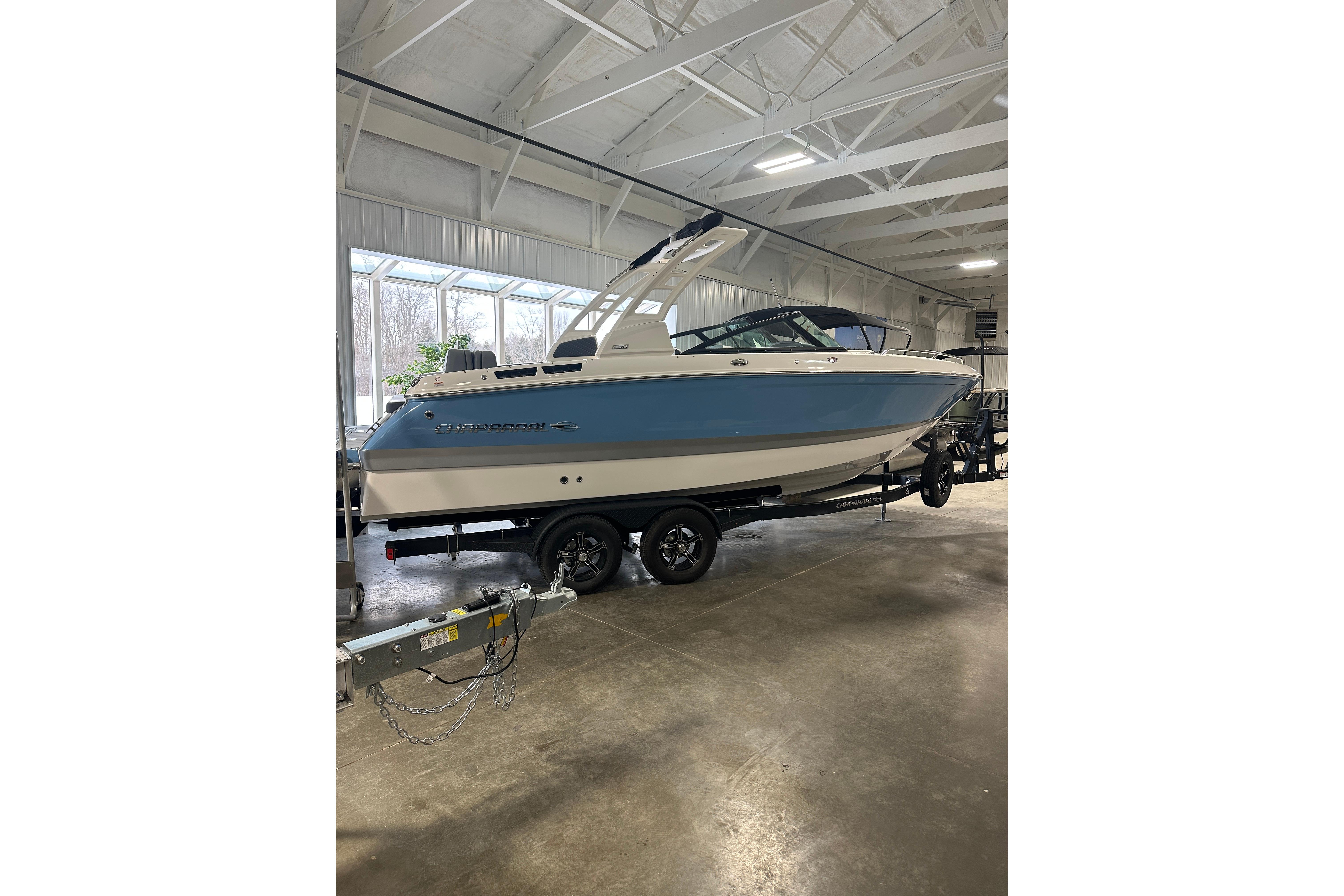 2026 Chaparral SSX 6 boat indoors on a trailer.