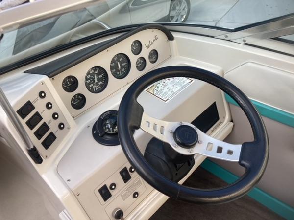 Dashboard of a 1992 Regal Valanti 200 boat with steering wheel.