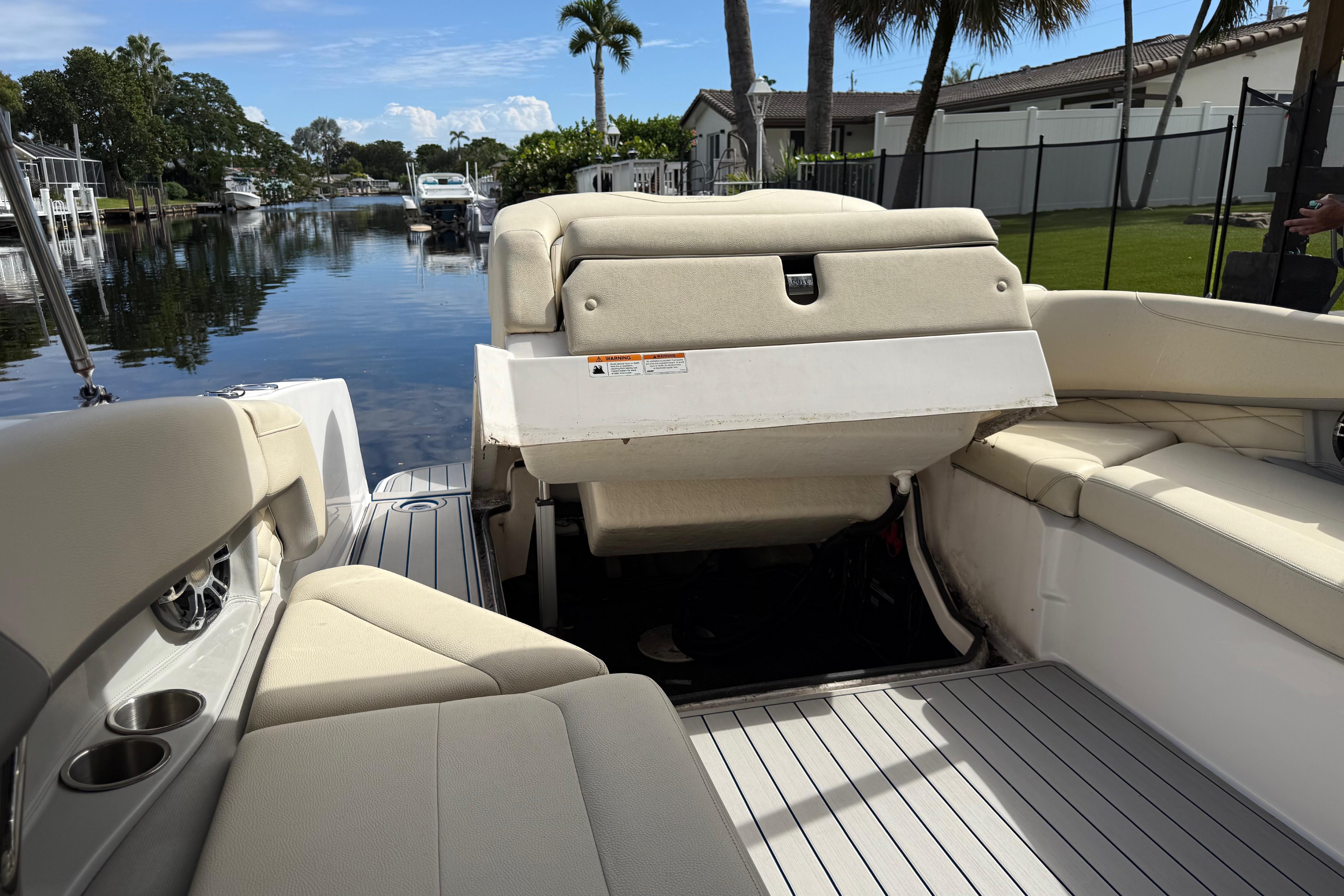 2021 Regal 26 OBX boat interior with beige seating and canal view.