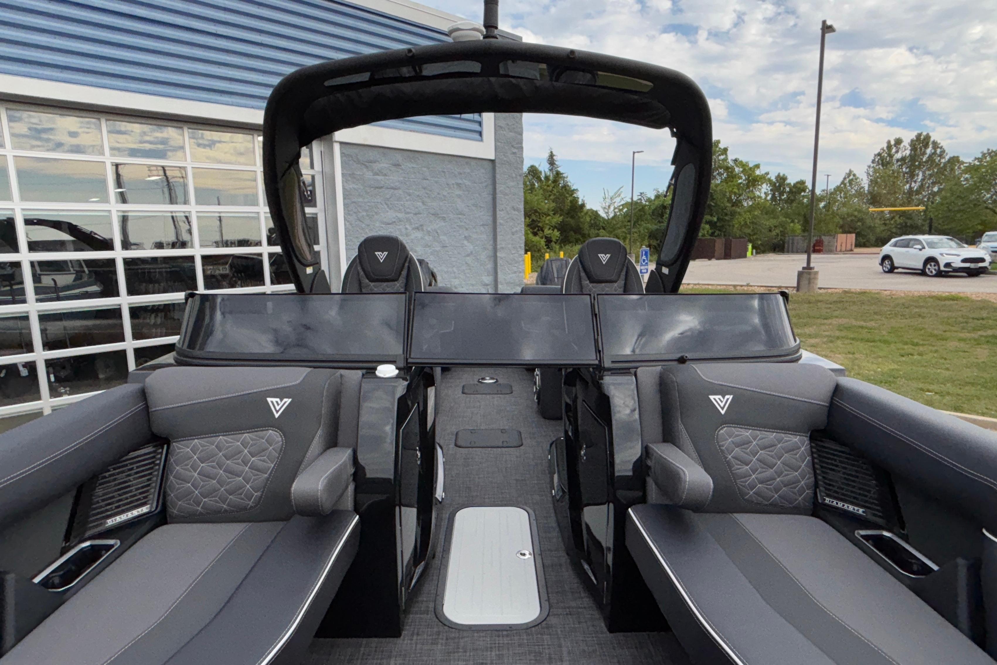 2026 Viaggio D28UW A-T boat interior with sleek gray seating and modern design.