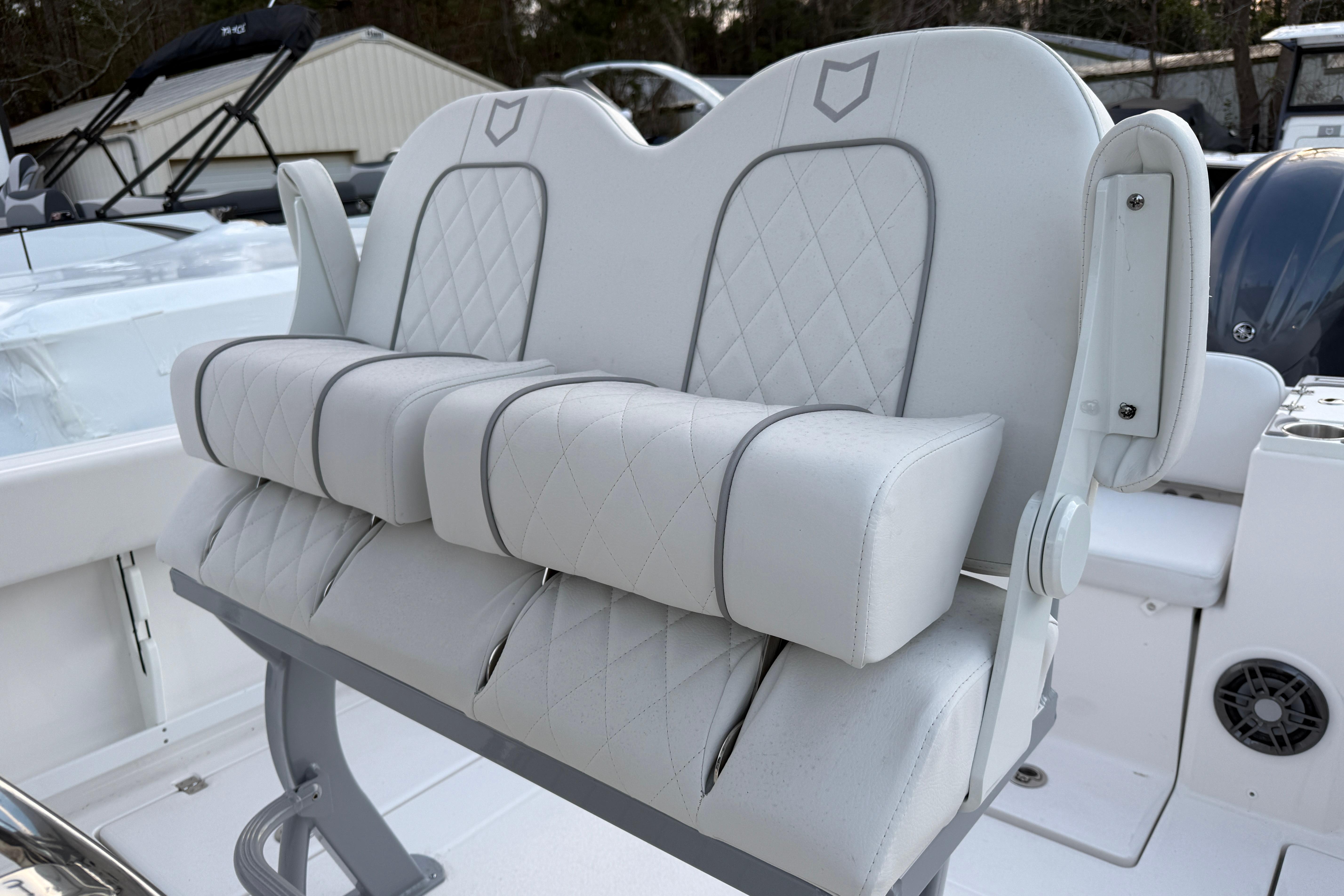Luxury seating on 2026 Sea Fox 268 Commander boat, featuring plush, diamond-stitched upholstery.