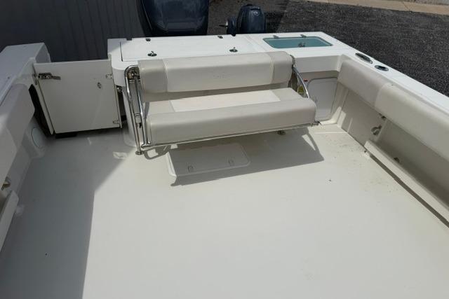 2016 Parker 2520 Sport Cabin boat interior with seating and storage compartments.