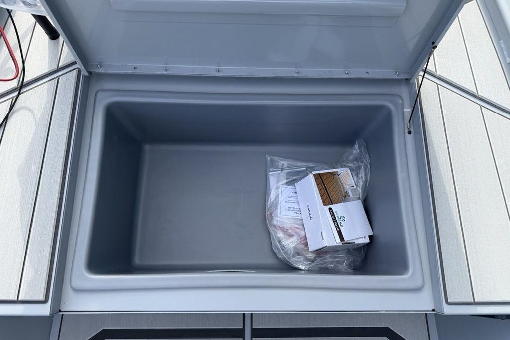 Open storage compartment in 2026 Tracker Bass Tracker Classic CC boat.