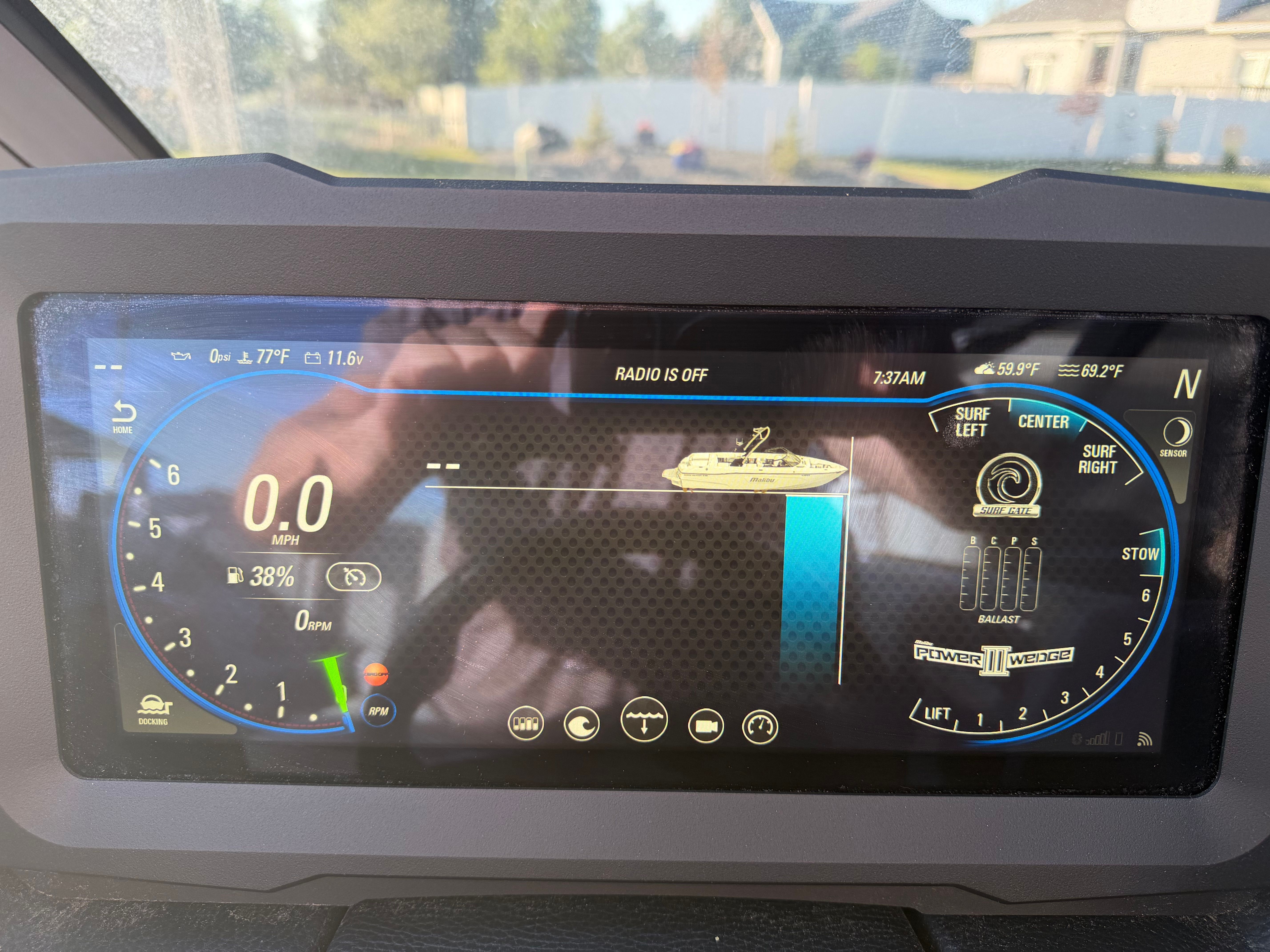 The image shows the dashboard of a 2021 Malibu Wakesetter 23 LSV with various displays and controls.
