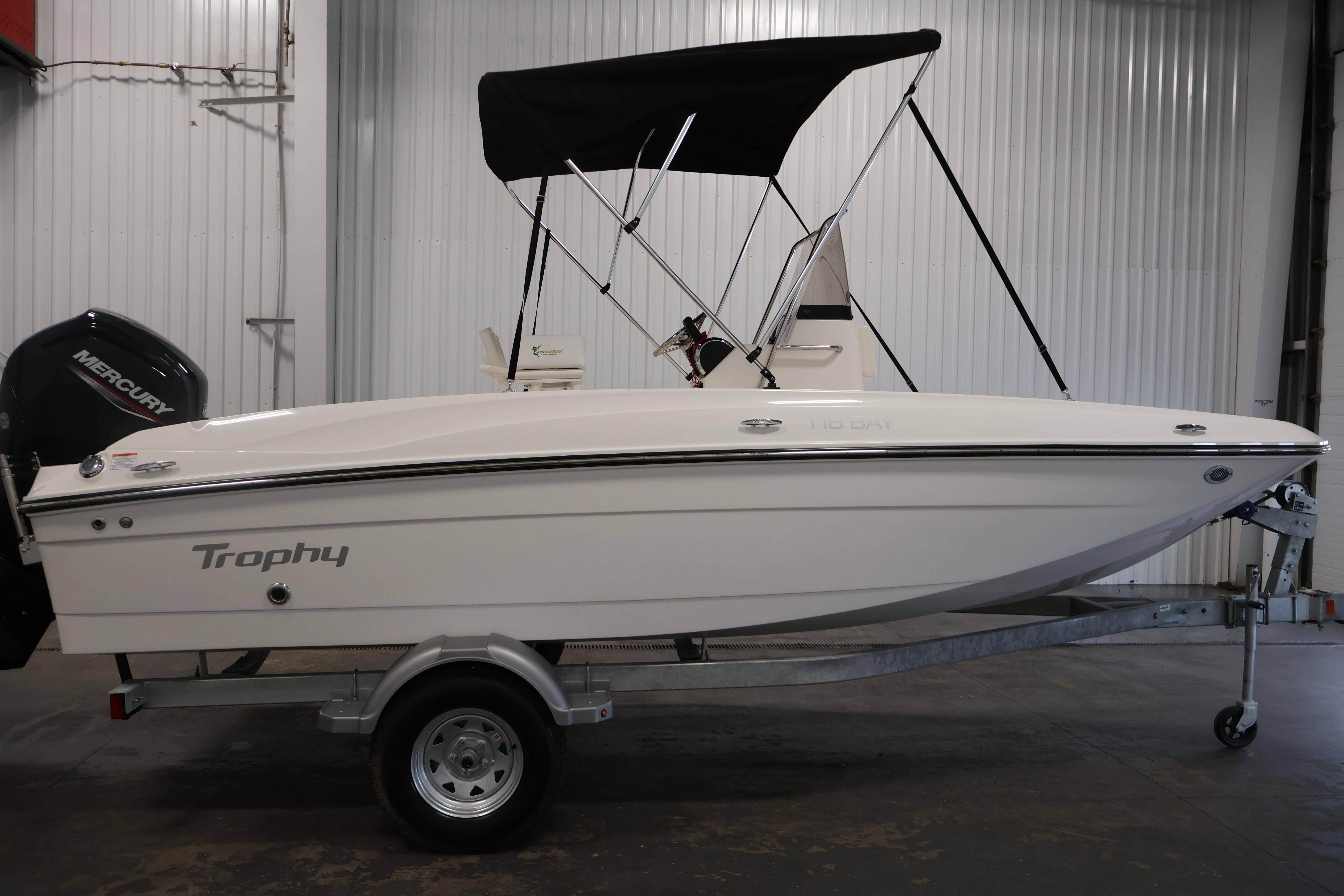 2026 Bayliner Trophy T18 boat on trailer in indoor storage.