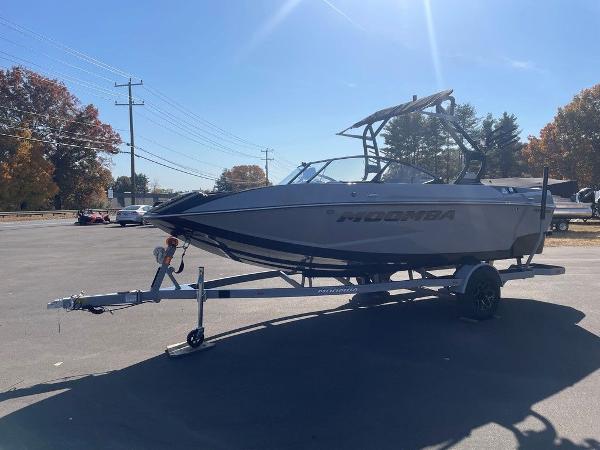 2025 Moomba Mondo boat on trailer in sunny parking lot.
