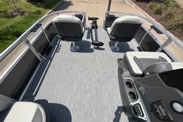 2026 Sun Tracker Bass Buggy 16 XL Select pontoon boat interior with seating and console.