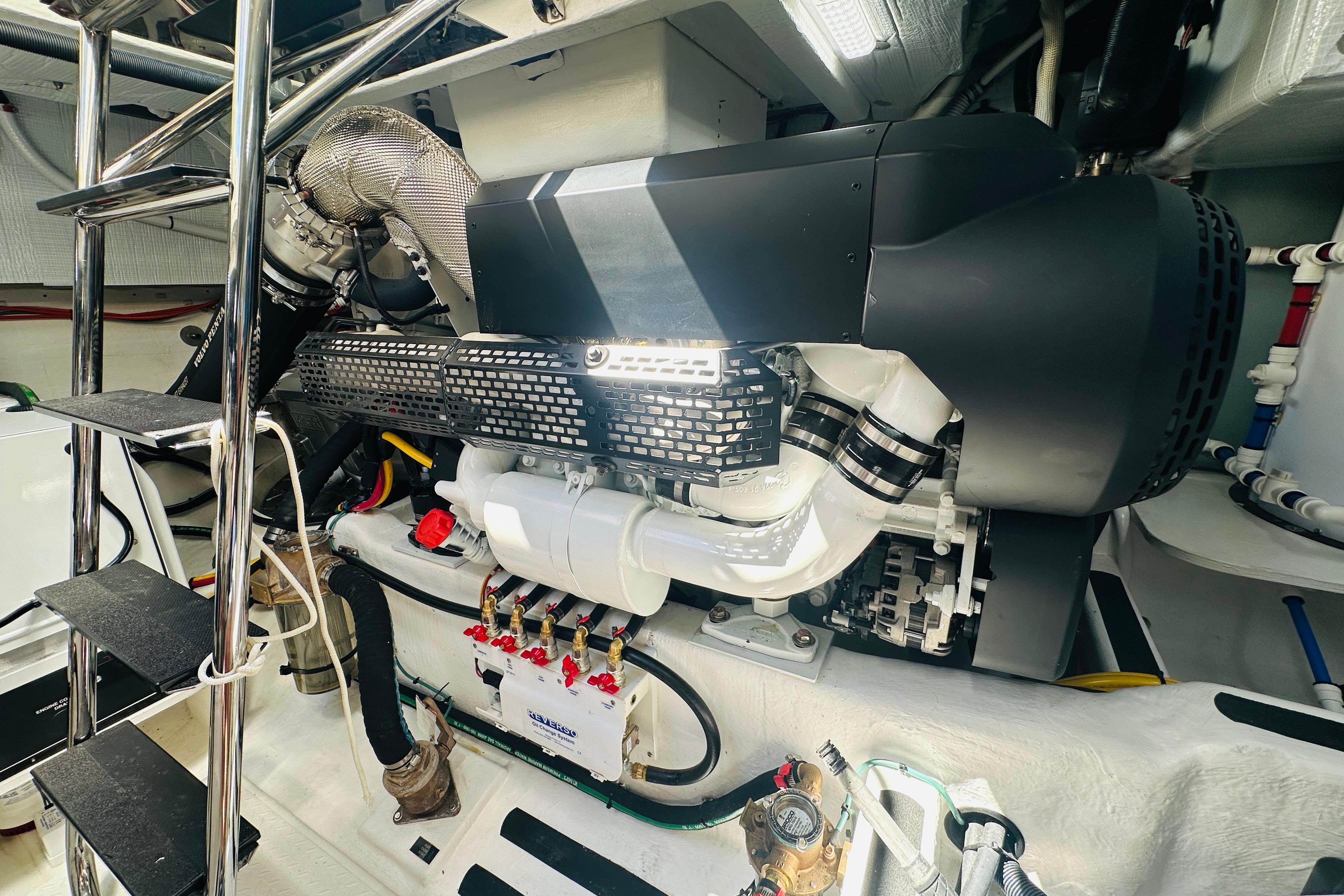 Engine room of 2025 Sabre 48 Salon Express, showcasing advanced mechanical components.