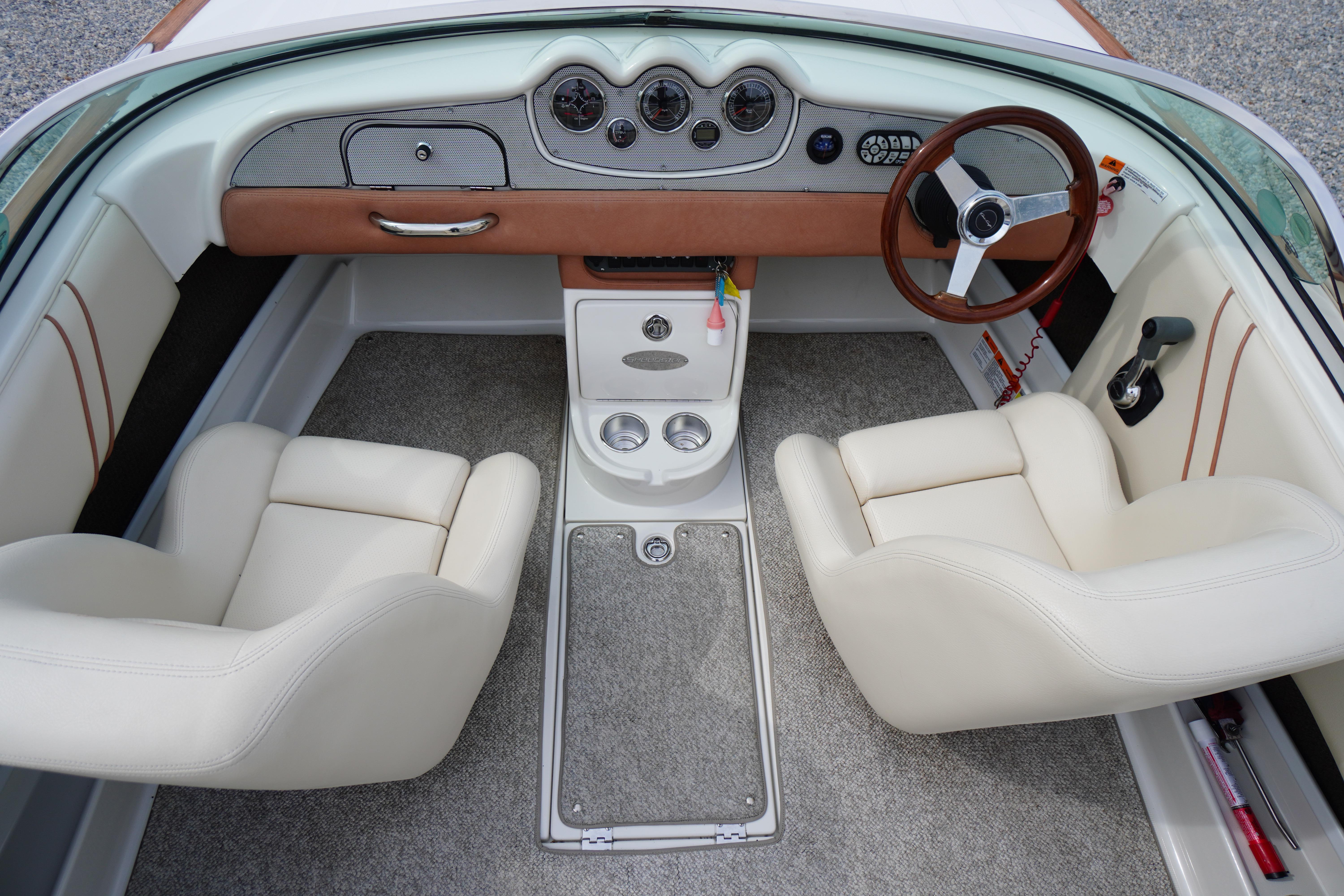 2005 Chris Craft Speedster Heritage interior with beige seats and classic dashboard design.