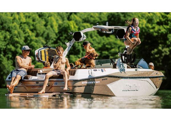 Manufacturer Provided Image: 2025 Malibu Wakesetter 23 LSV with people enjoying water activities.