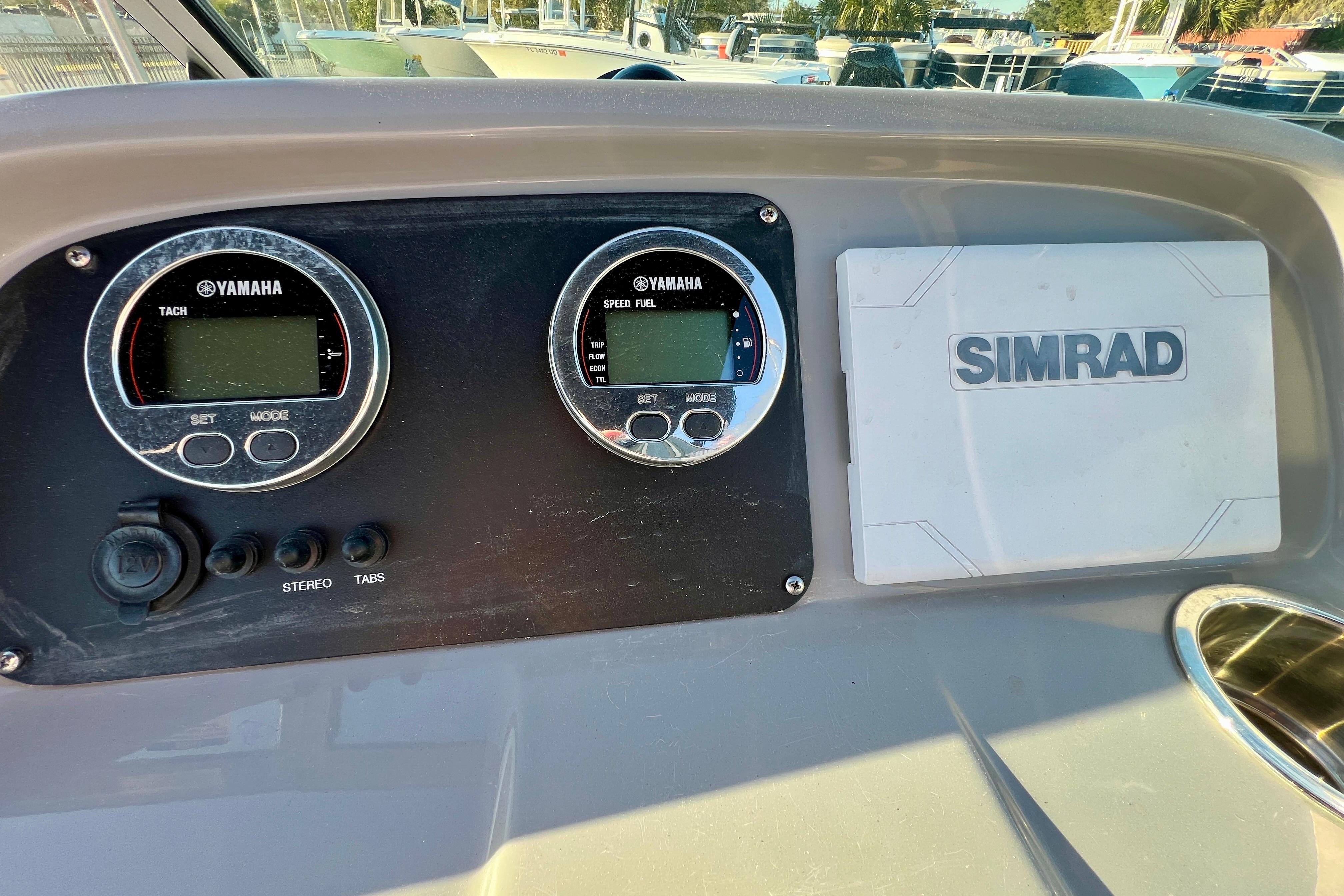 Dashboard of 2024 Robalo R207 Dual Console with Yamaha gauges and Simrad display.