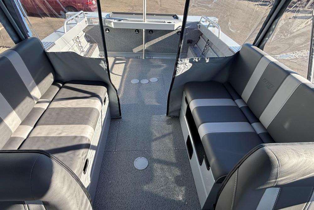Interior of 2025 Hewescraft 200 ProV ET boat with gray seating and spacious layout.