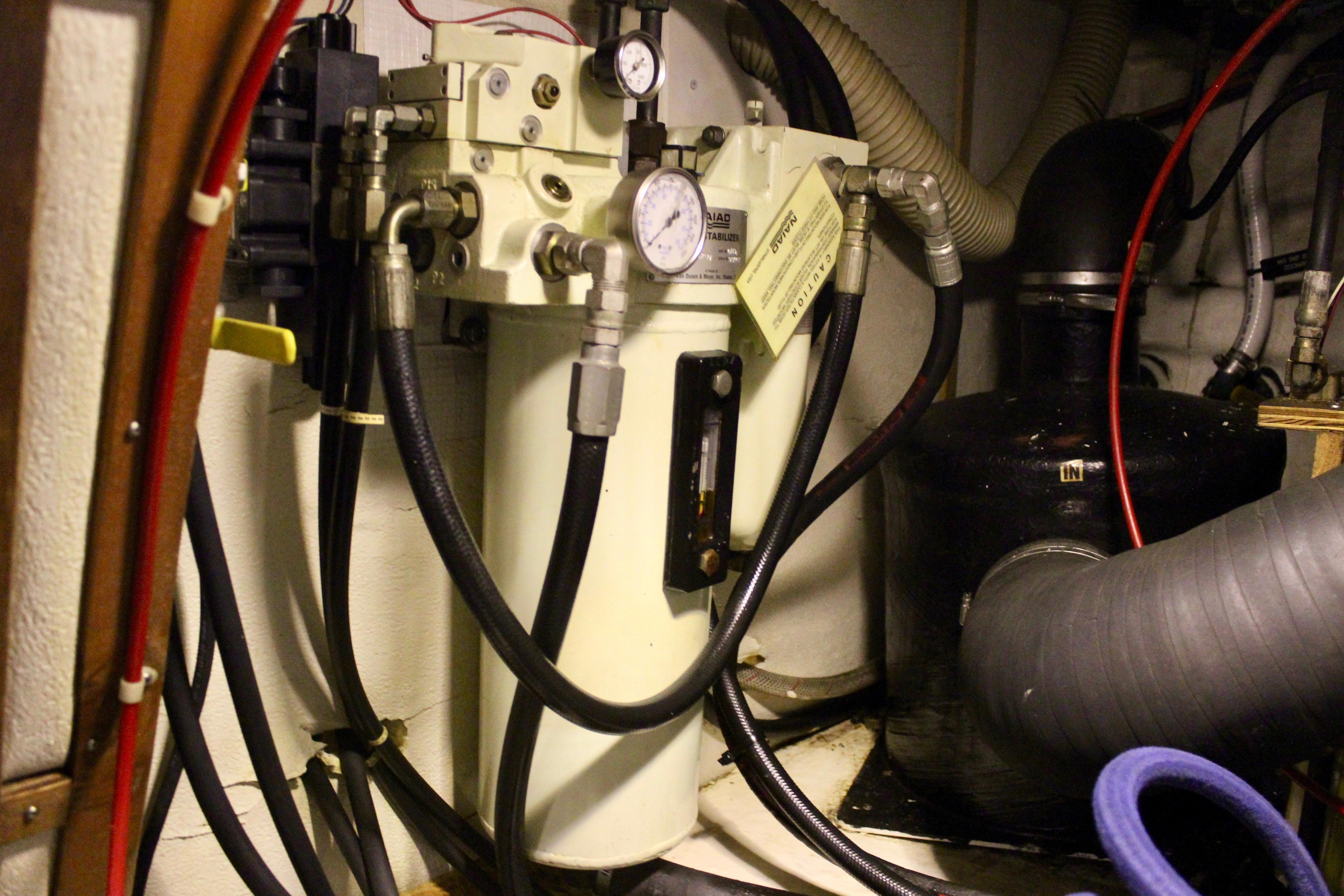 Engine room of 1986 Kha Shing Spindrift 46 with hydraulic system components.