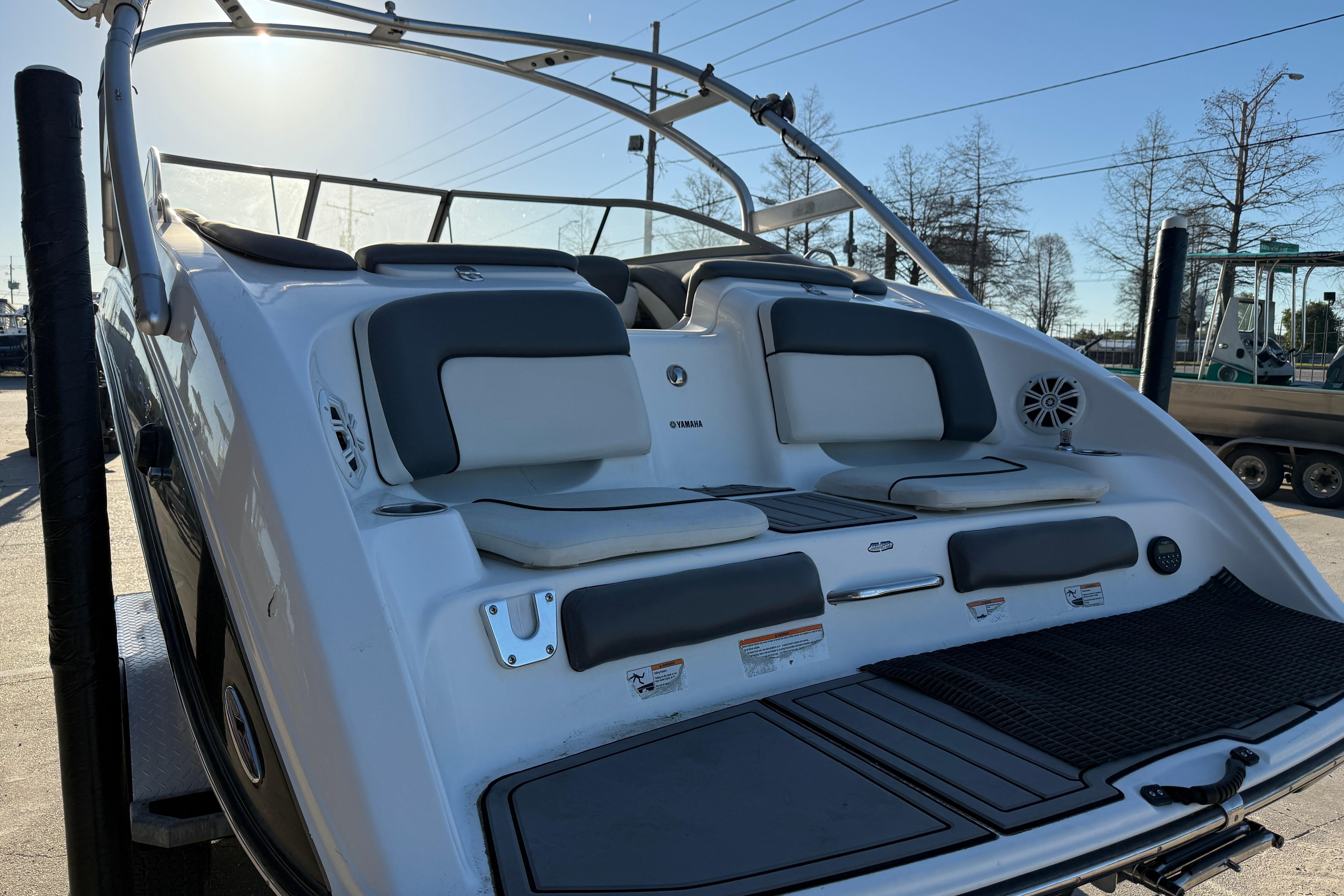 2011 Yamaha Boats 242 Limited S, rear view with seating and swim platform.