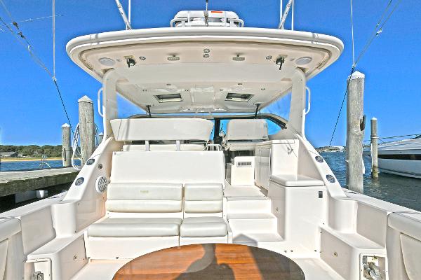 2008 Tiara Yachts 4200 Open, spacious deck, luxury seating, docked at marina.