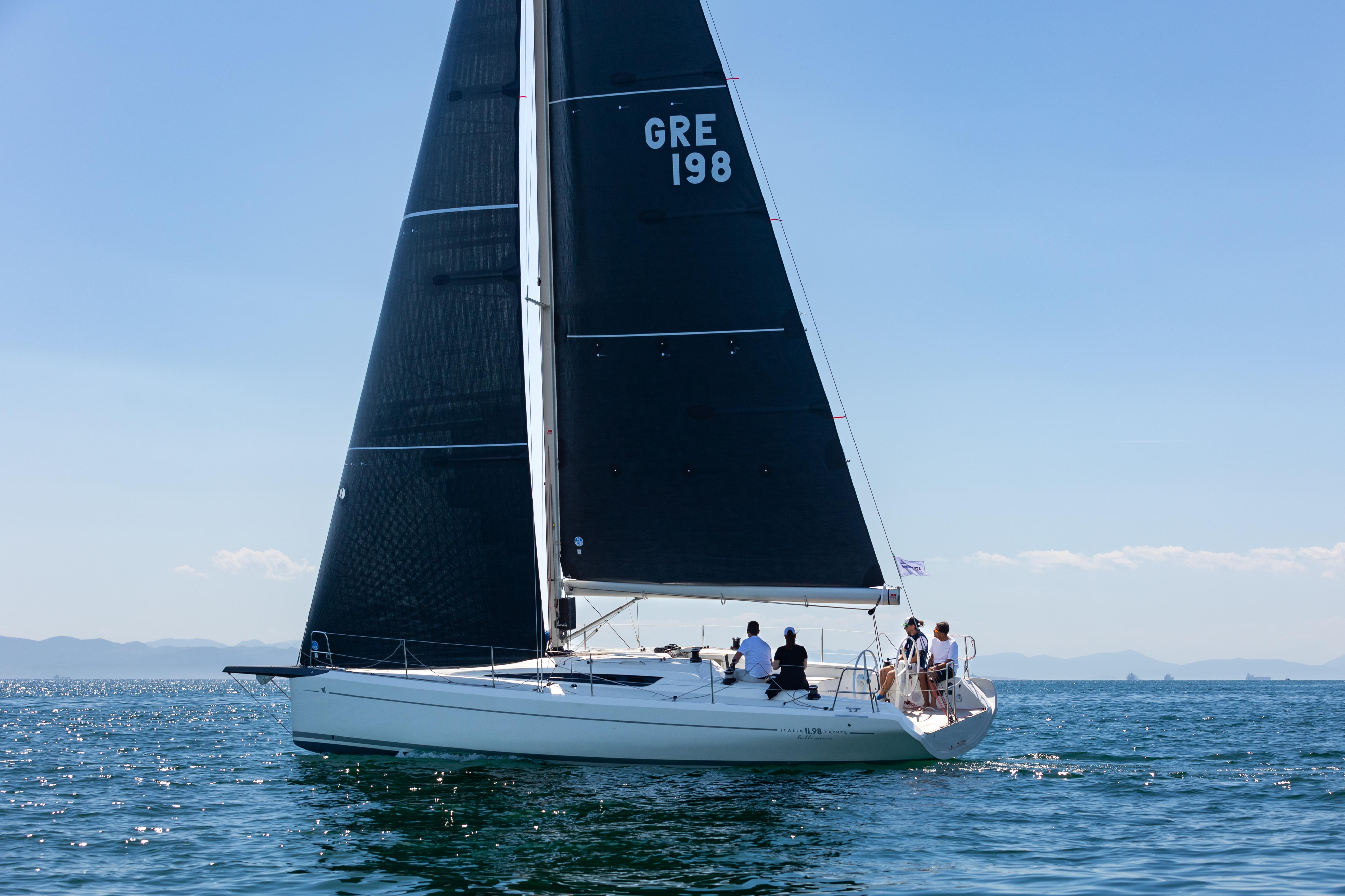 2023 Italia Yachts IY11.98 Bellissima sailing on open water with crew.